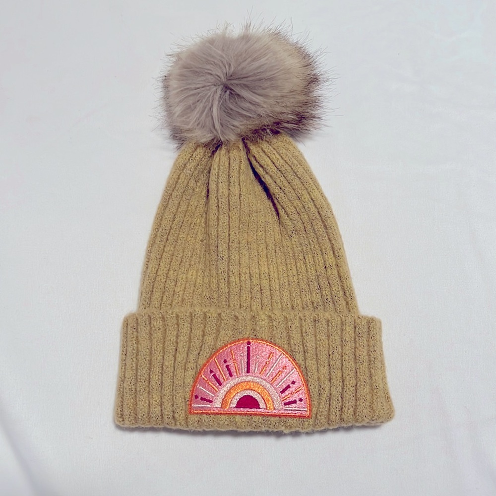 Rainbow beanie with puff ball